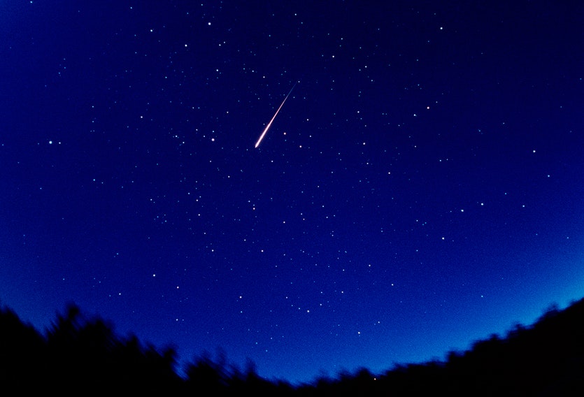 Meteor in deep blue sky