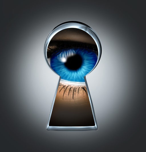 Eye Looking Through A Keyhole