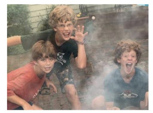 three boys pretending to be scary