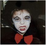 kid dressed as dracula